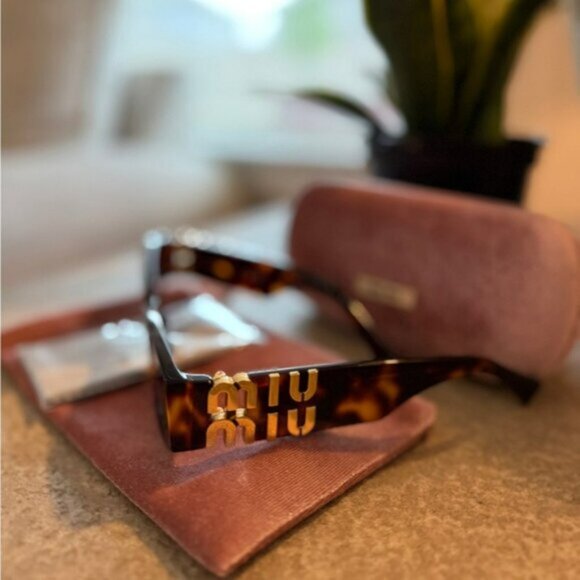 Miu Miu Tortoiseshell Sunglasses